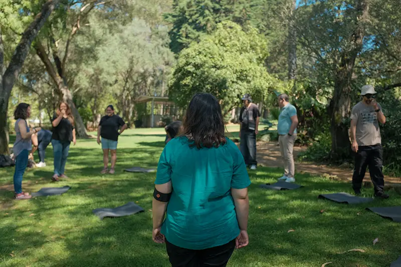 people in the forest arranged in a circle